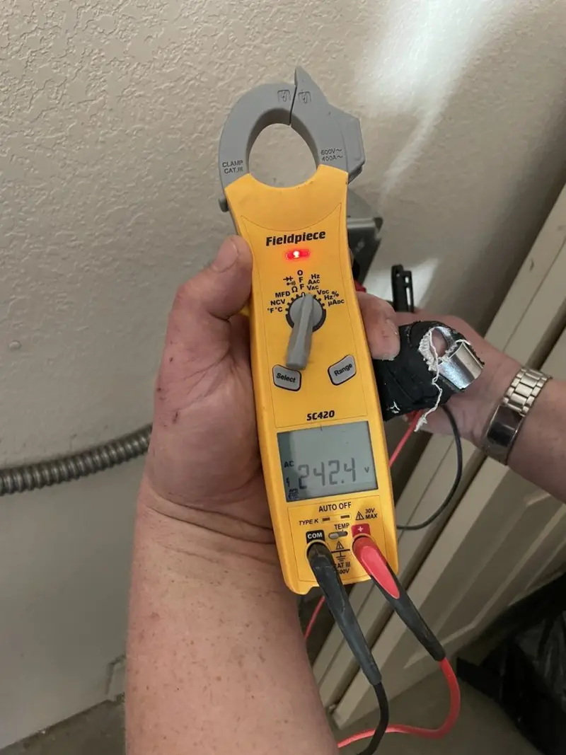 Voltage testing with clamp meter during Generator Installation in El Rio